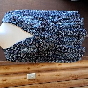 Black with rose, magenta flowers with blue/ lt rose decorations. Venus, M blouse